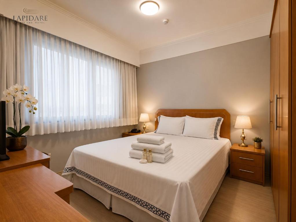 Quarto — Lapidare Flat Hotel Comfort