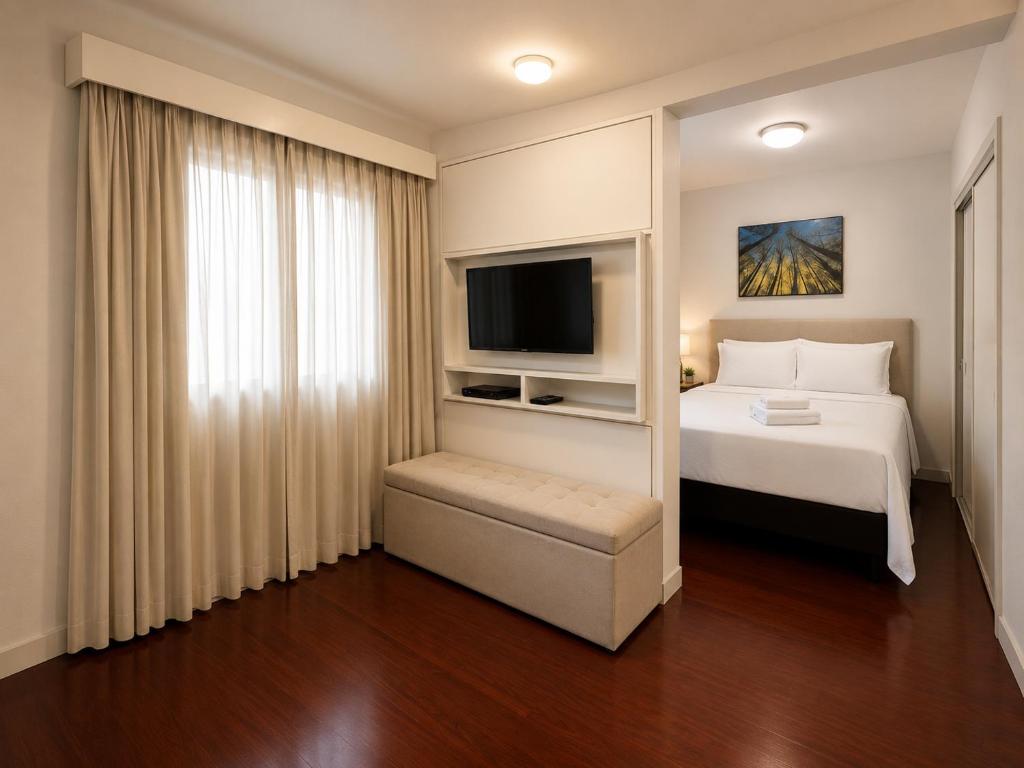 Sala de TV — Lapidare Flat Ninety Jardim Paulista