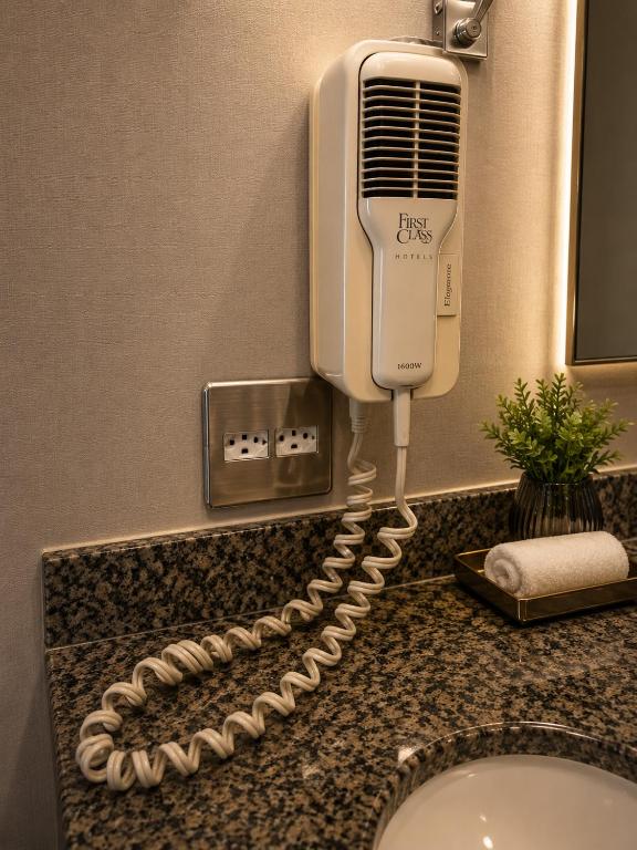 Área de lavanderia — Lapidare Flat Mercure Paulista